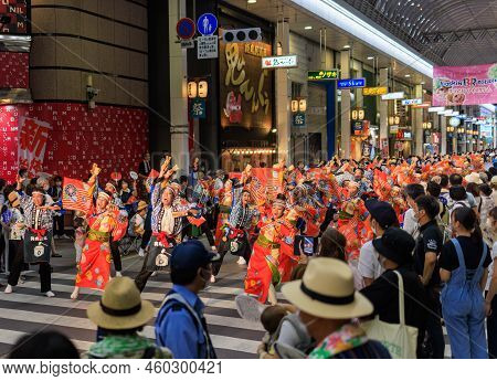 Kochi, Japan - August 10, 2022: Energetic Dancers In Shopping Arcade During Summer Yosakoi Festival