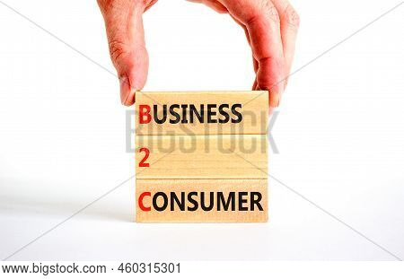 B2c Business To Consumer Symbol. Concept Words B2c Business To Consumer On Wooden Blocks On A Beauti