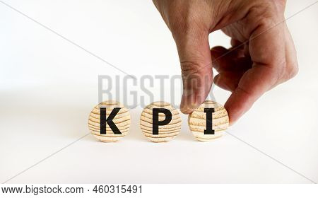Kpi, Key Performance Indicator Symbol. Concept Word Kpi, Key Performance Indicator On Wooden Circles
