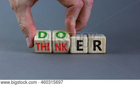 Doer Or Thinker Symbol. Concept Words Doer Or Thinker On Wooden Cubes. Businessman Hand. Beautiful G