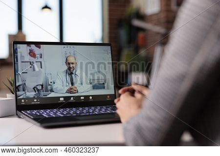 Young Woman Using Videocall Telemedicine With Doctor, Doing Healthcare Appointment To Talk About Tre