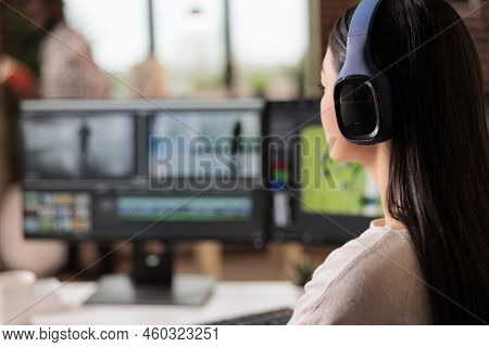 Creative Videographer Editing Movie Footage At Home, Using Professional Effects Software. Content Cr