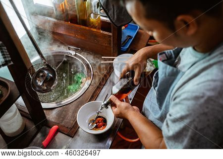 The Seller Prepares The Into The Bowl