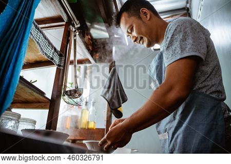 Close Up Of A Seller Prepares The The Bowl