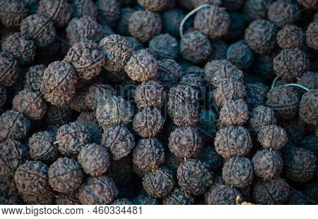 Top View Of Rudraksh Bead Heap With Selective Focus In Horizontal Orientation