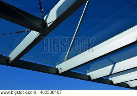 Strut, Suspended Glass Roof Above The Building Entrance. Bus Station, Railway Station. Cable Wind Br