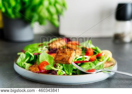 Healthy Salad With Roasted Tempeh, Fresh Cherry Tomatos, Beetroot Straws, Spinash And Lettuce Leaves