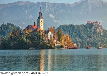 Fabulous Sunny Day View Of Popular Tourist Destination  Bled Lake. Dramatic View Of Pilgrimage Churc