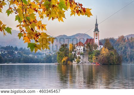 Astonishing Sunset View Of Popular Tourist Destination  Bled Lake. Dramatic View Of Pilgrimage Churc