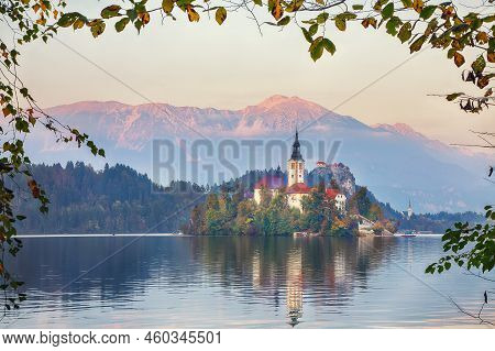 Astonishing Sunset View Of Popular Tourist Destination  Bled Lake. Dramatic View Of Pilgrimage Churc
