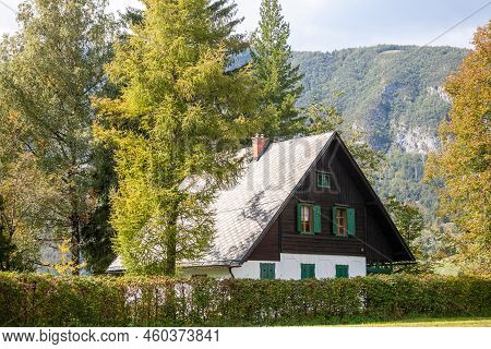 Residential House, A Slovenian Chalet Building, In The Middle Of A Mountain Glade, A Clearing In The