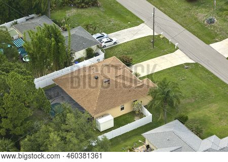 Aerial View Of Typical Contemporary American Private House With Roof Top Covered With Asphalt Shingl