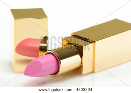Pink Golden Lipstick On White Background