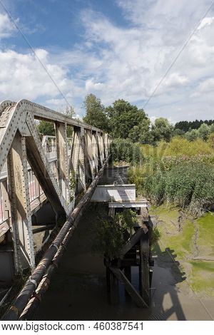 Side Of An Old Iron Bridge Over The River Durme In Hamme, Belgium