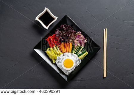 Korean Dish, With Variety Of Appetizers With Vegetables And Eggs. Diet. Bibimbap. Top View. Square P
