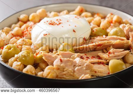 Traditional Tunisian Chickpea Soup Served For Breakfast Lablabi With A Poached Egg And Tuna Closeup 