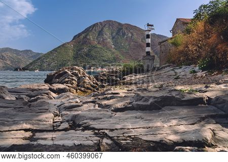 Lighthouse And Gospa Od Andjela Church In Montenegro