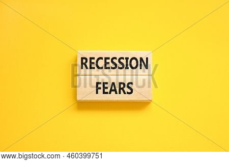 Recession Fears Symbol. Concept Words Recession Fears On Wooden Blocks On A Beautiful Yellow Table Y