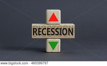 Recession Up Or Down Symbol. Concept Word Recession And Up And Down Arrow On Wooden Blocks On A Beau