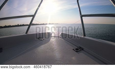 Seascape, View Of Sea Waves With Sun Reflection From Prow Of Motorboat. Boat Jumping On Waves On Sun