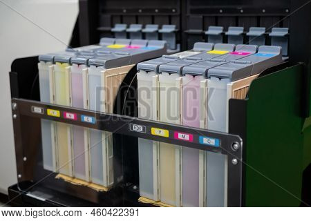 Row Of Inkjet Printer Cmyk Cartridges - Cyan, Magenta, Yellow, Key Or Black Colors - Close Up View.