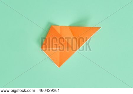 Origami Bear. Step-by-step Photo Instruction On A Green Background. Diy Concept. Step5.