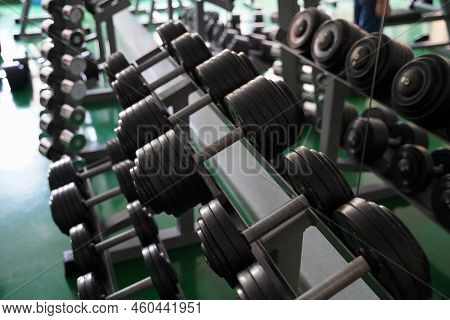 Gym With A Large Selection Of Dumbbells And Barbells.
