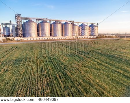 Grain Elevator. Metal Grain Elevator In Agricultural Zone. Agriculture Storage For Harvest. Grain Si