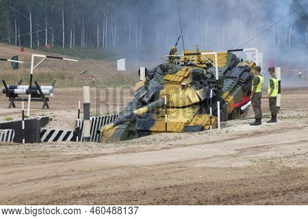 Alabino, Russia - August 19, 2022: Tank T-72b3 Of The Tajik Team Overcomes The 