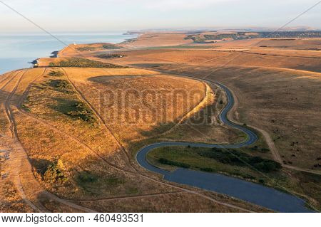 Stunning Aerial Drone Landscape Image Of Golden Hour Over Farmers Fields In South Downs National Par