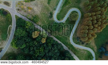 Winding Bike Path In The City Park. City Park At Dawn. Aerial Photography.