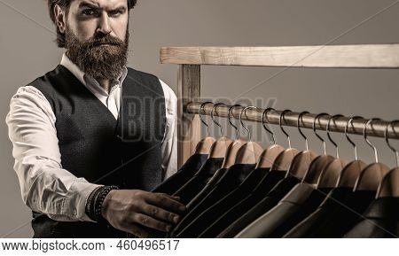 Stylish Mens Suit. Handsome Bearded Fashion Man In Classical Costume Suit. Man Suit, Tailor In His W