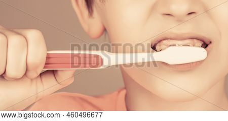 Health Care, Dental Hygiene. Joyful Child Shows Toothbrushes. Little Boy Cleaning Teeth. Kid Boy Bru
