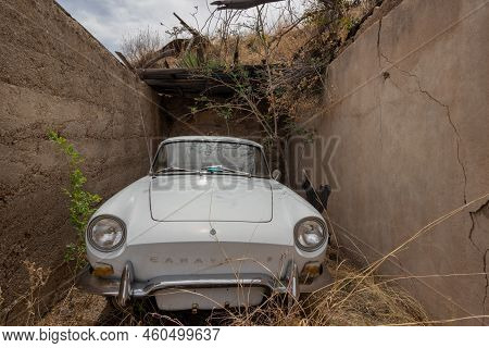 Bisbee, Arizona, United States - April 19, 2022: A Classic Caravelle Car Parked In The Foundation Of