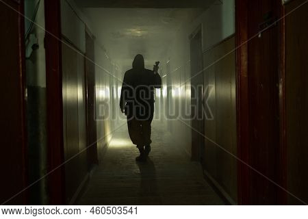 Brave Post Apocalyptic Survivor With Gas Mask And Flashlight. Environmental Disaster, Crime And Chem