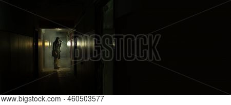Brave Post Apocalyptic Survivor With Gas Mask And Flashlight. Environmental Disaster, Crime And Chem