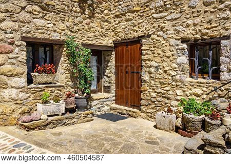 Facade Of A Typical House Made Of Stone In The Mountains Of Catalonia, Beget, Girona.
