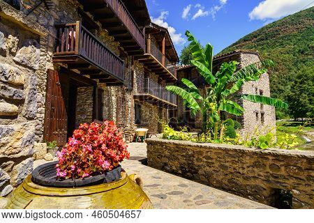 Typical Houses Made Of Stone And Wooden Balconies In The Mountain Village Of Beget, Girona, Spain.