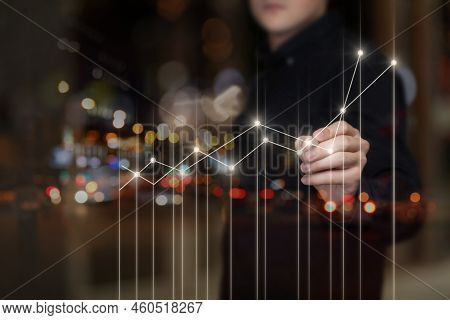 The Manager Draws A Financial Growth Chart On The Computer Virtual Screen.