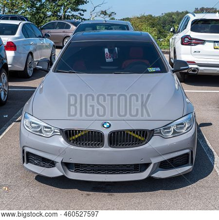 Monroeville, Pennsylvania, Usa August 28, 2022 A Used Bmw Sedan For Sale At A Dealership On A Sunny 