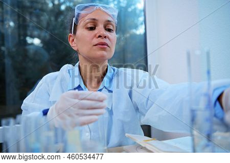Portrait Of A Beautiful Latin American Woman, Medical Scientist, Pharmacologist Working On A New Gen