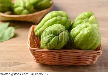 Chayote Squash Fruit In Basket On Wooden Table, Organic Vegetables