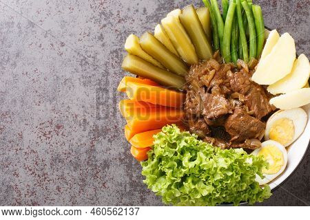 Selat Solo Javanese Dish Of Braised Beef Steak In Sweet Soy Sauce With Eggs, Potatoes And Vegetables