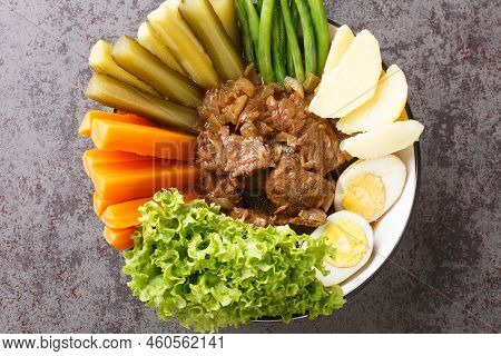 Beef Stew Served With Vegetable Salad Named Selat Solo Against Dark Background Closeup In The Bowl O