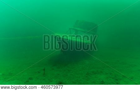 Gloomy Underwater Wreck Of Recreational Speed Boat