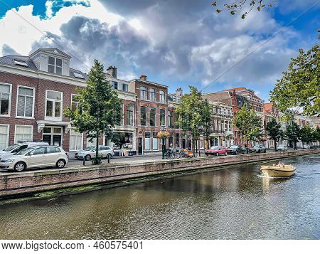 Den Haag, Netherlands - August 25 2021 : Typical Historic Dutch House Along A Canal In The Center Of