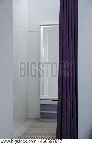 Empty Dressing Room In Fashion Store. Stylish Interior
