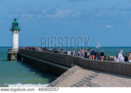 Calais, France - 26 June 2022: People Walking On Calais Jetty