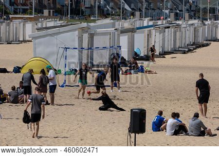 Calais, France - 26 June 2022: Young People Playing Handball On The Beach Of Calais During Summertim