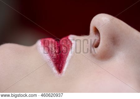 Permanent Tattoo Concepts. Young Woman Having Permanent Makeup On Lips In Beautician Salon